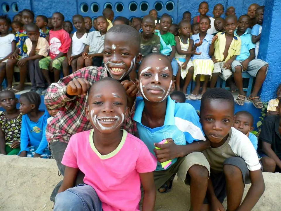 Smiling children in community programme supported by Hear Their Roar